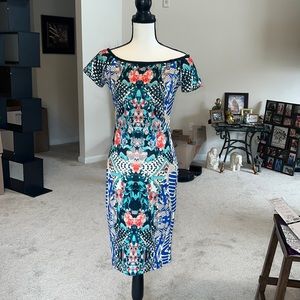 Medium dress. Multicolored. Off the shoulders. Super cute!